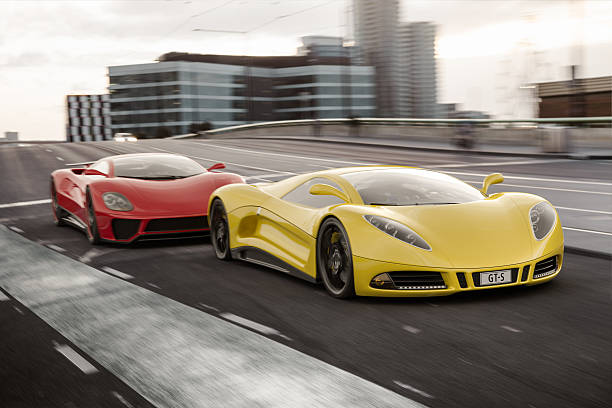 Street Racing Modern yellow and red sports cars speeding along a city street. Unique and generic sports car designs.  Both cars designed and modelled entirely by myself. Very high resolution 3D composite render. All markings are ficticious. street racing stock pictures, royalty-free photos & images