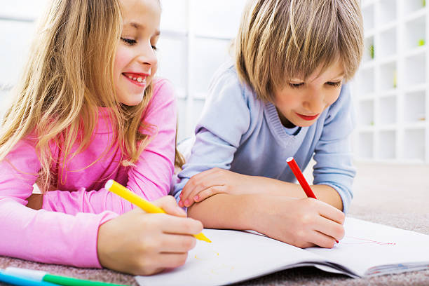 istock Children drawing with colorful markers. 186565010