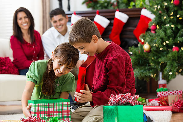 240+ Happy Hispanic Mom Opening Christmas Presents With Her Family Stock  Photos, Pictures & Royalty-Free Images - iStock