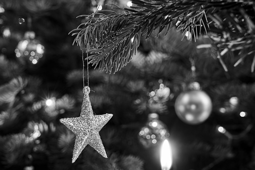 A star-shaped spruce tree decoration during Christmas in Poland, Poland, monochrome