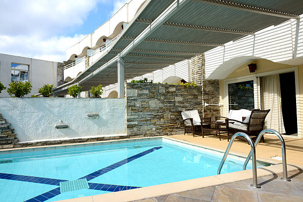 istock Swimming pool by villa at luxury hotel, Halkidiki, Greece 186565698
