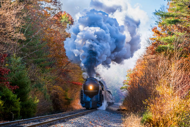 istock Steam Locomotive Traveling Through the Fall Trees 1865657078