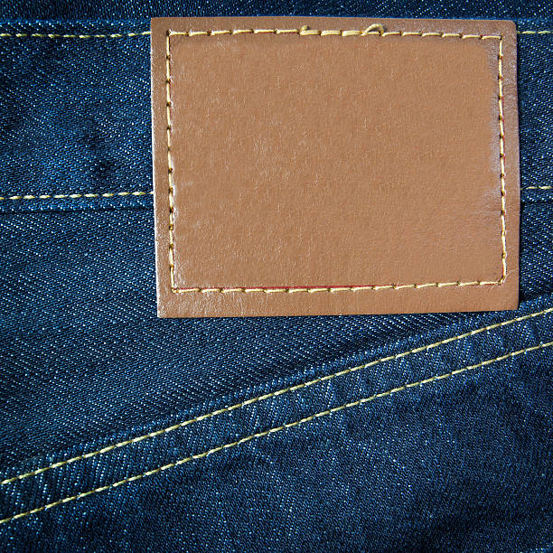 Leather jeans label sewed on jeans.