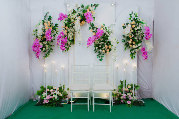 istock flower arrangements as a backdrop for wedding celebrations in Indonesia. 1865668250