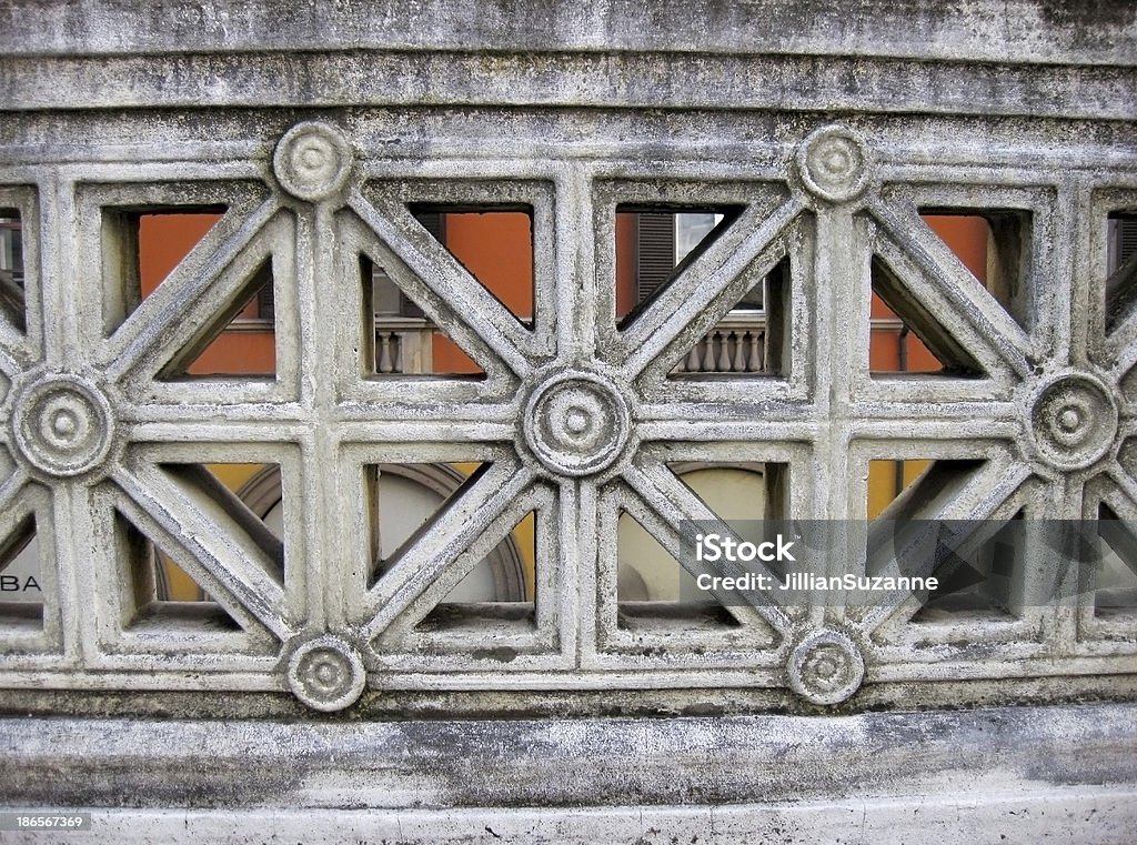 Italy, Street Detail. Detail from a stairway railing in Bologna Italy, with colorful buildings in the background Angle Stock Photo