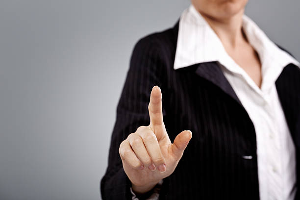 istock Businesswoman pressing button on touch screen 186567456