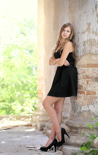 istock Girl in a black dress. 186571123