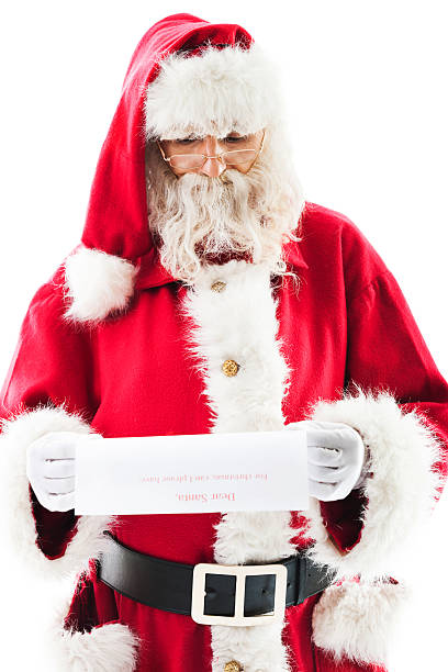 istock Santa Claus reading letter. 186571131