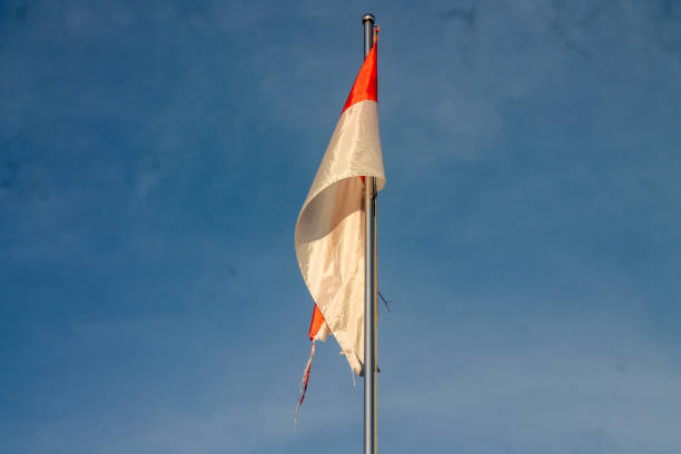 Old Indonesian flag on the wind