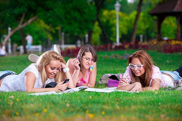 istock happy young high school students or gollege girls 186573178