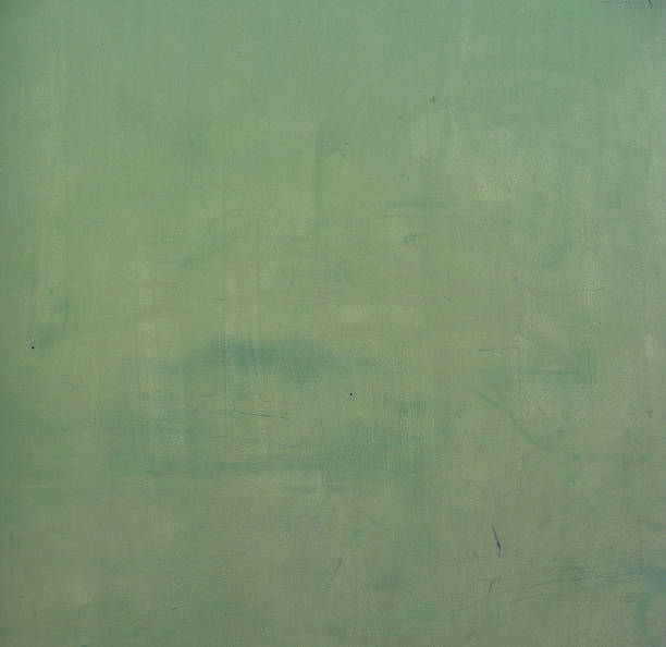istock worn grunge green paint on wooden panel 186574449