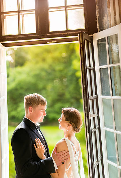 istock Groom Looking At Bride on wedding day 186574576