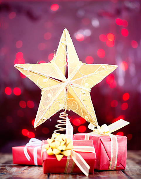 istock Gold Christmas Star With Gifts 186575236