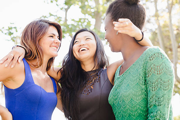 istock Three young women having fun at the park 186578827