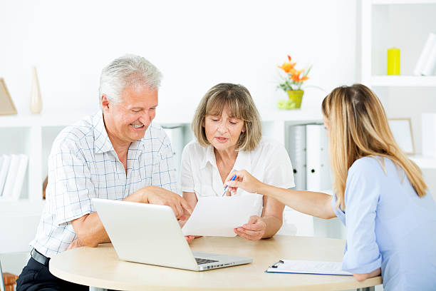 istock Senior Couple Meeting with Financial advisor. 186579353