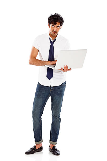 istock Handsome young man with a laptop over white 186579439