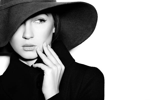 istock Young beautiful woman wearing hat 186579747