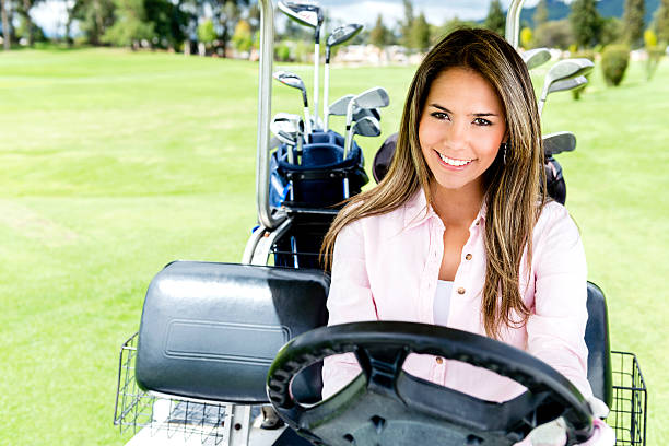 istock Smiling golfer in a golf cart 186579752