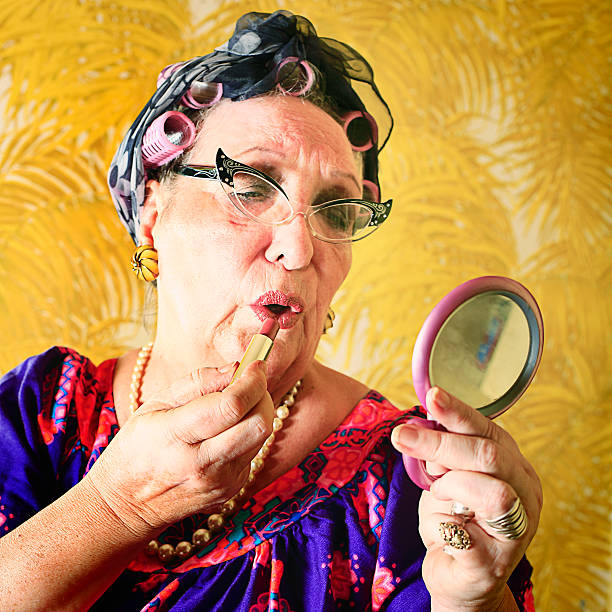 Crazy Granny Putting On Her Makeup stock photo