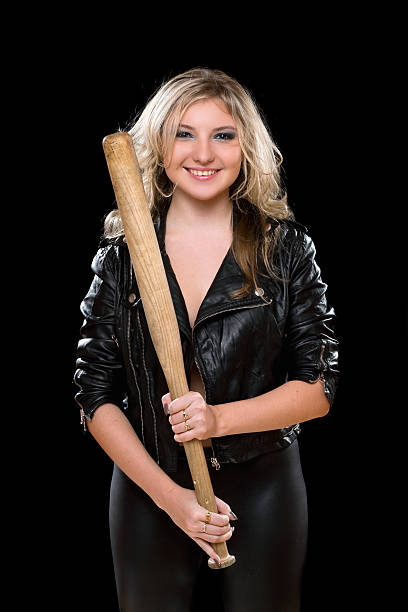 istock Cheerful young blonde with a bat 186583027