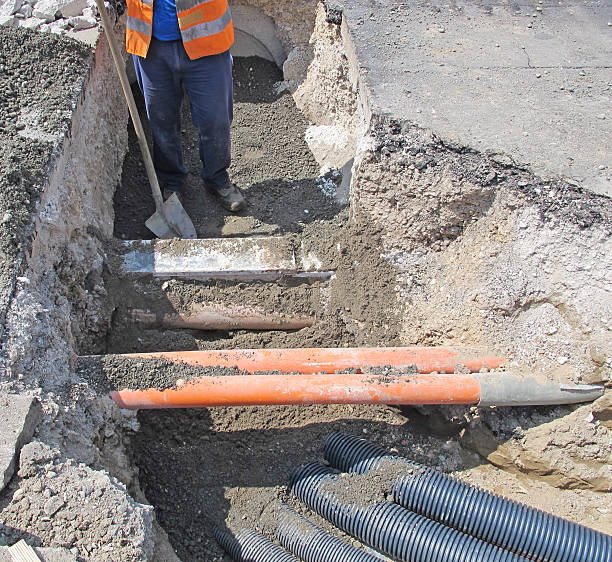 istock laying of optical fiber and electric cables 186586111