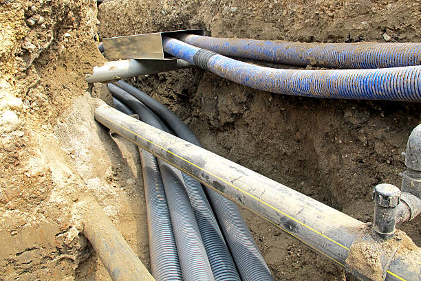 istock electrical cables and optical fibres in the digging 186586118