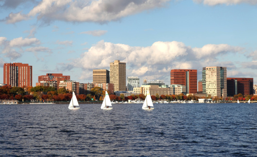 Sailing the Charles River along the Cambridge skyline