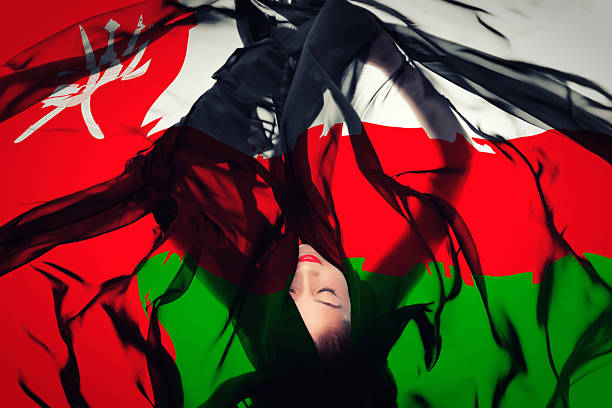 istock Young girl with Omani Flag 186586557
