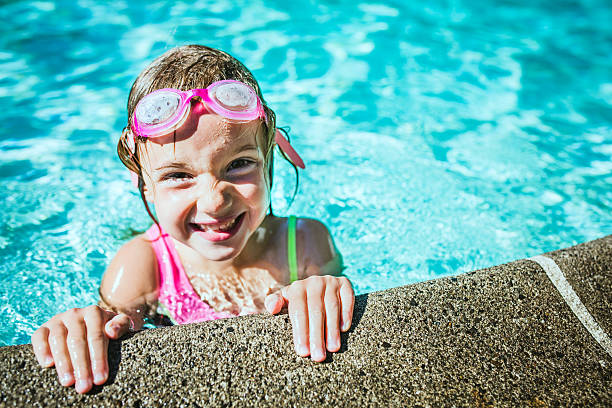 istock Girl with Goggles in Swimming Pool 186586937