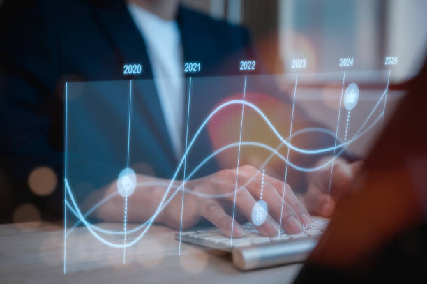 istock businessman typing on keyboard Analyst working with Business Analytics and Data Management System researching or analysing a report with KPI and metrics connected to database 1865877752