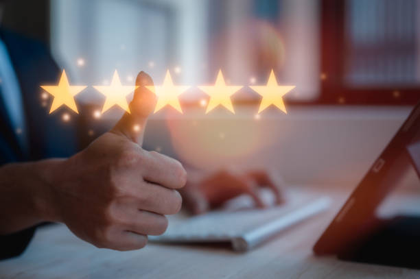 istock feedback and Customer service satisfaction survey concept.Businessman, customers show satisfaction by pressing  on five star bar in satisfaction on virtual touch screen 1865879263