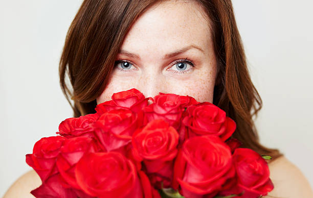 Free Stock Photo of Person Holding a Bunch of Red Roses | Download Free ...