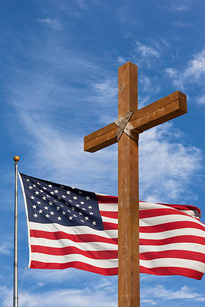 istock Rugged cross and American Flag 186589086