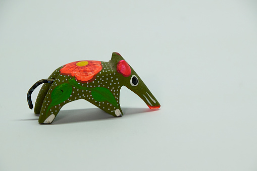 Colorful animal souvenirs made of wood, which represent the Mexican tradition on the Day of the Dead