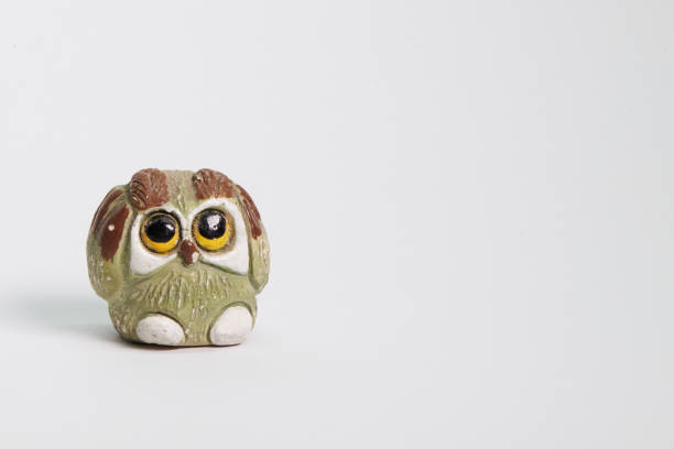 istock Owl figure made of carved stone 1865900809