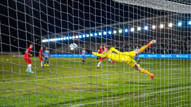 istock Soccer goalkeeper catching ball 1865900823