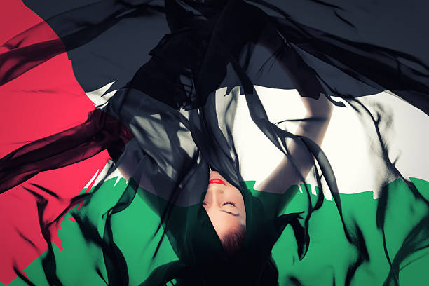 istock Young girl with Palestinian Flag 186591052