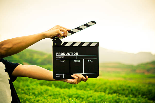 istock Clapper board with beautiful green scenery in background 186591662