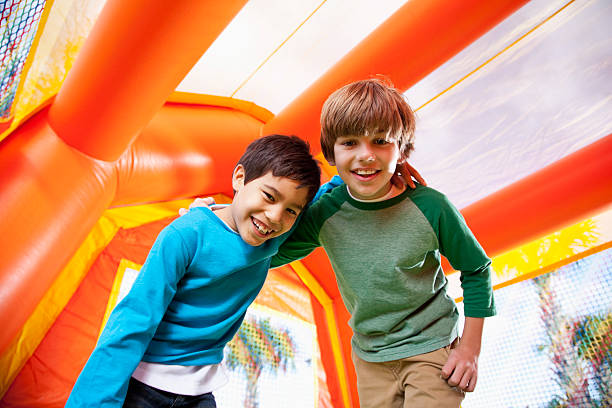 istock Boys in bounce house 186591999