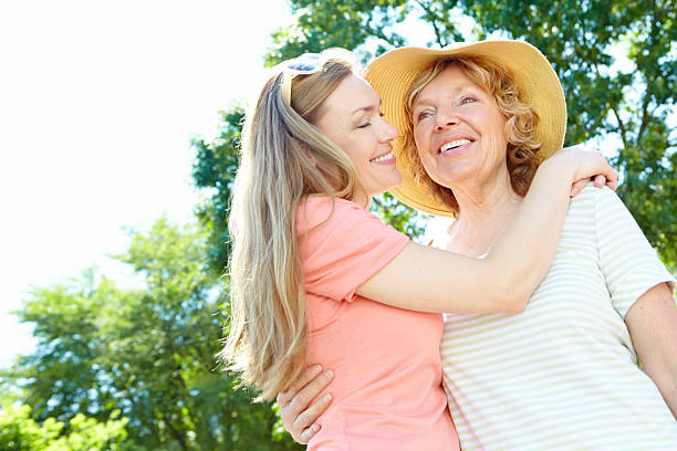 istock Mother and daughter being affectionate in the sun 186593222