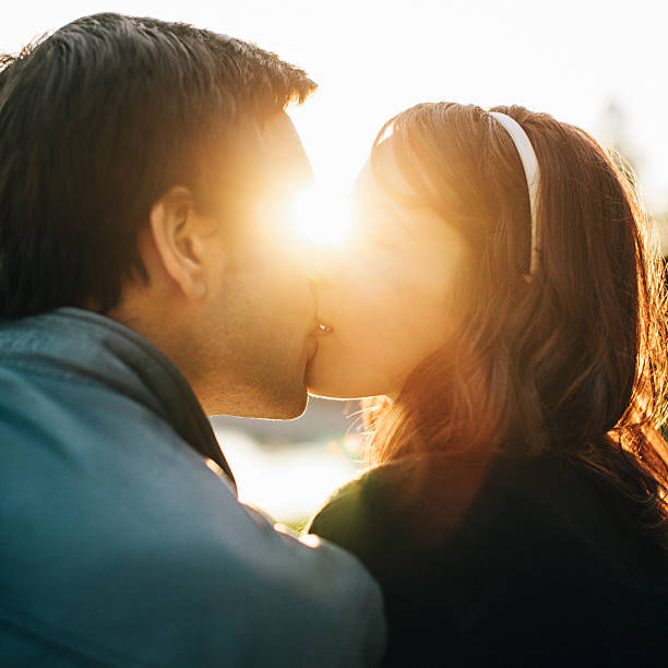 istock Couple Kissing 186593455
