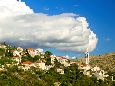 Town Lozisca not far from Milna  is small inland  town on island Brac, Croatia. A houses are made of white  marble like USA White House one.