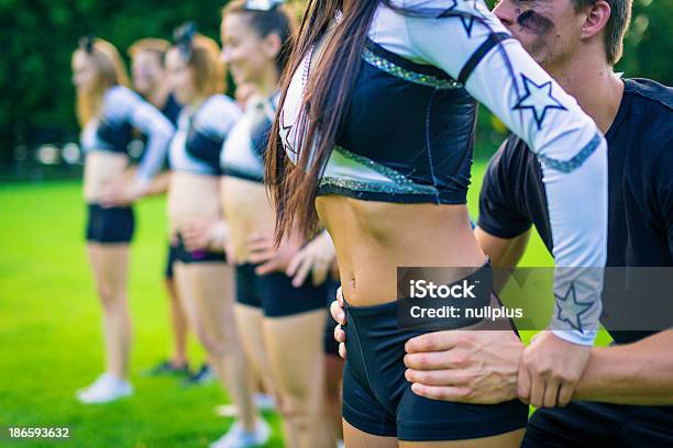 Cheerleaders Practicing Stock Photo - Download Image Now - Cheerleader, Sport, Competition