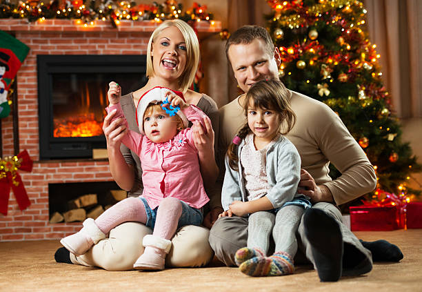 istock Happy family on Christmas Eve. 186594848
