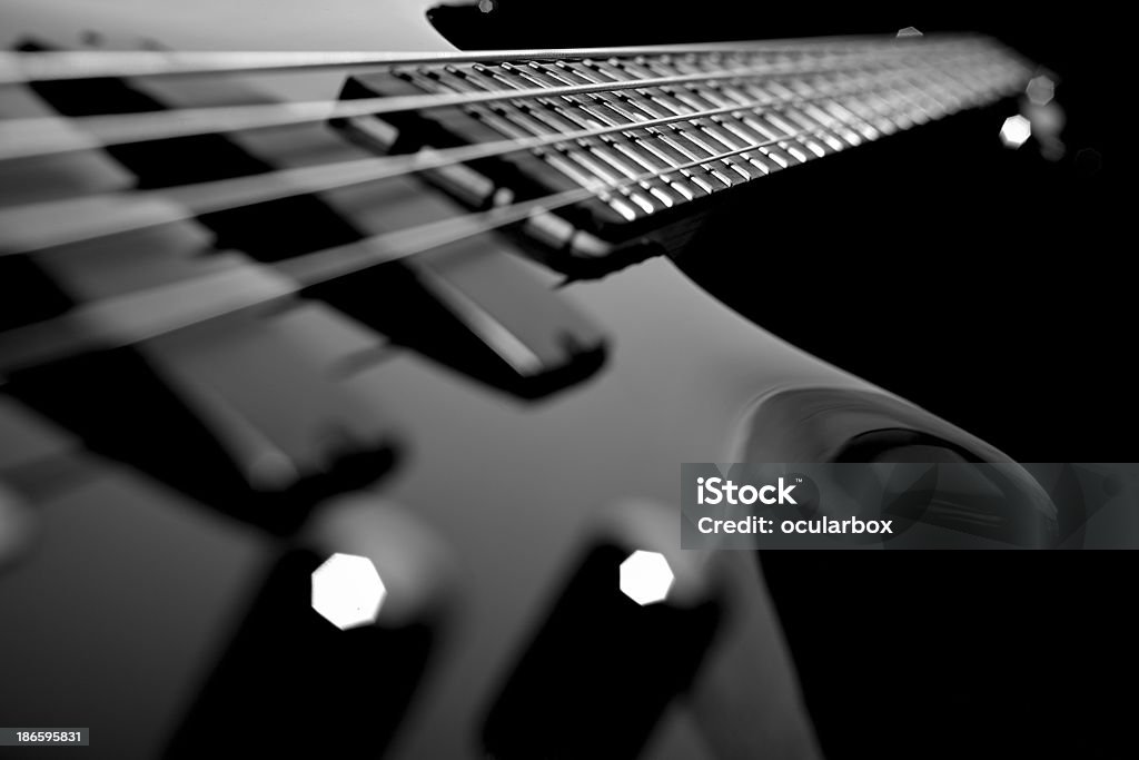 Bass Guitar Balck&White Bass Guitar on Black Background with selective focus Bass Guitar Stock Photo