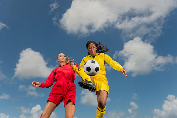 istock Young Women Playing Football 186595856