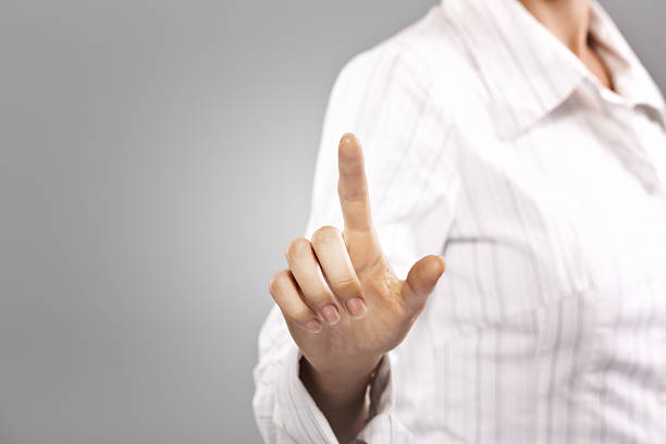 istock Businesswoman pressing button on touch screen 186596550