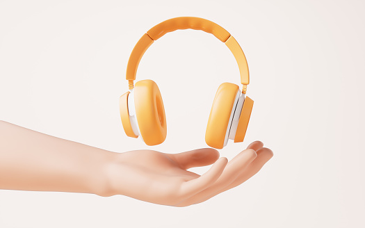 An orange earphone in a hand, 3d rendering. 3D illustration.