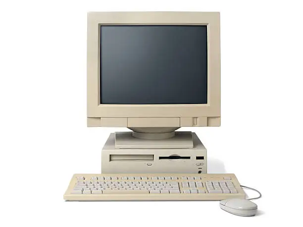 Retro computer isolated on white. Clipping path included for easy change background.