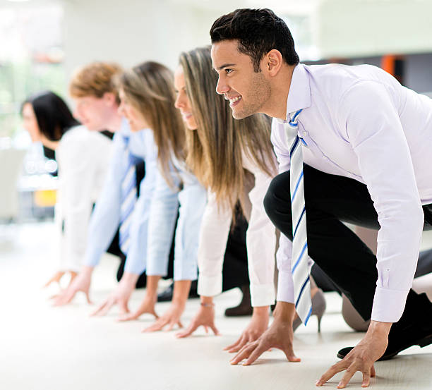 istock Group of competitive entrepreneurs ready to start running 186599634